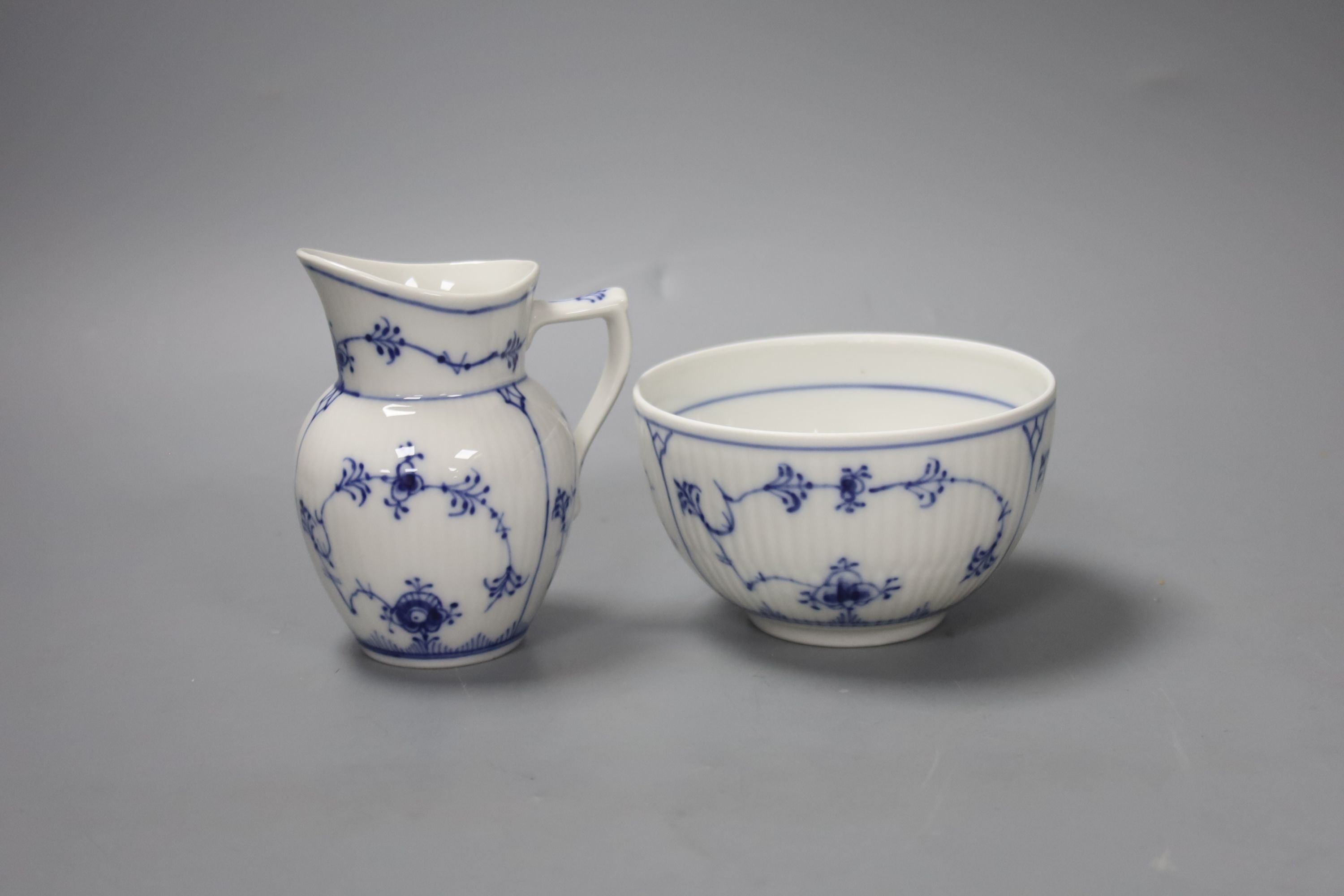 A Royal Copenhagen ‘Blue Onion’ pattern coffee service (setting for eight)